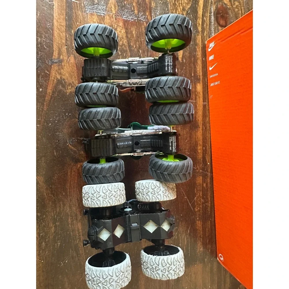 Monster Truck Dino Toy Lot‎ of 3 T-Rex Spinosaurus Triceratops One Rev Up